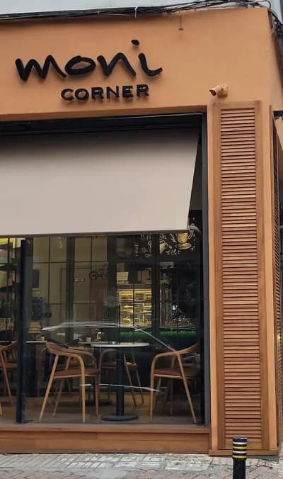 Cephedeki el yazısı moni corner tabelası